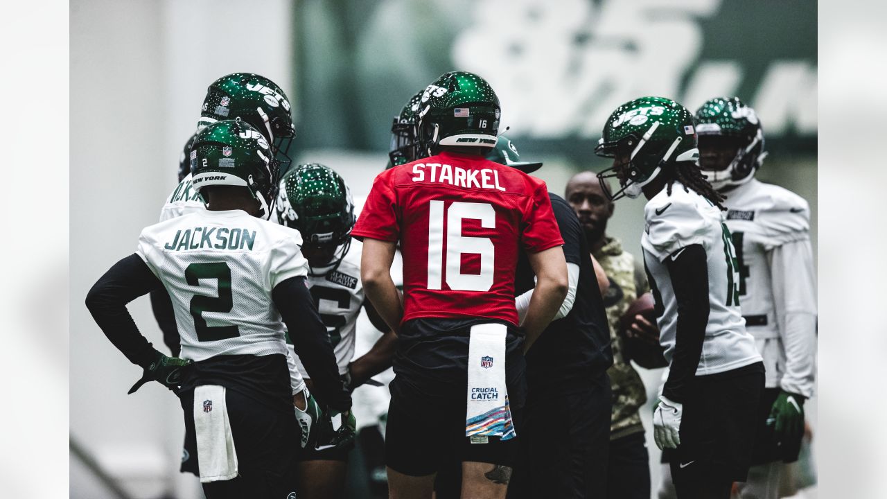 A New York Jets helmet on the field during practice at the team's