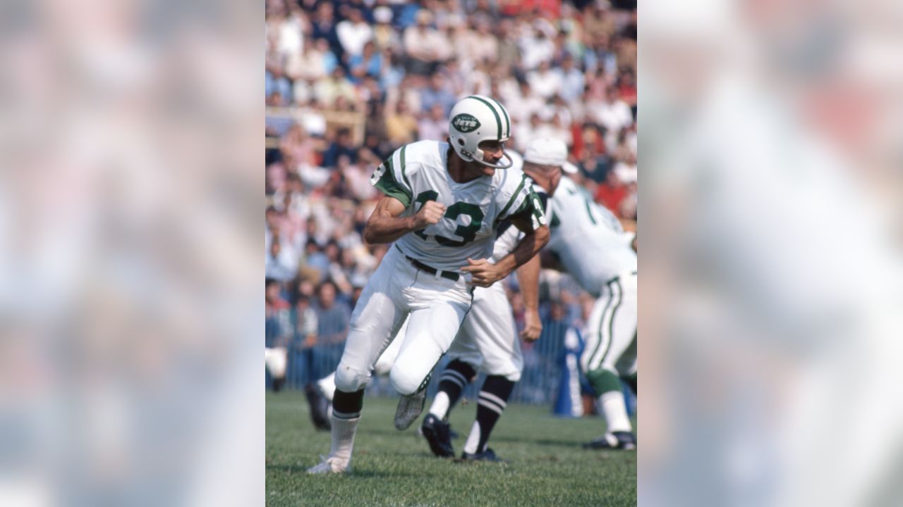 New York Jets hall of fame quarterback Joe Namath and Don Maynard (13)  stand on the field during a ceremony honoring the Super bowl III Jets at  halftime of the New York