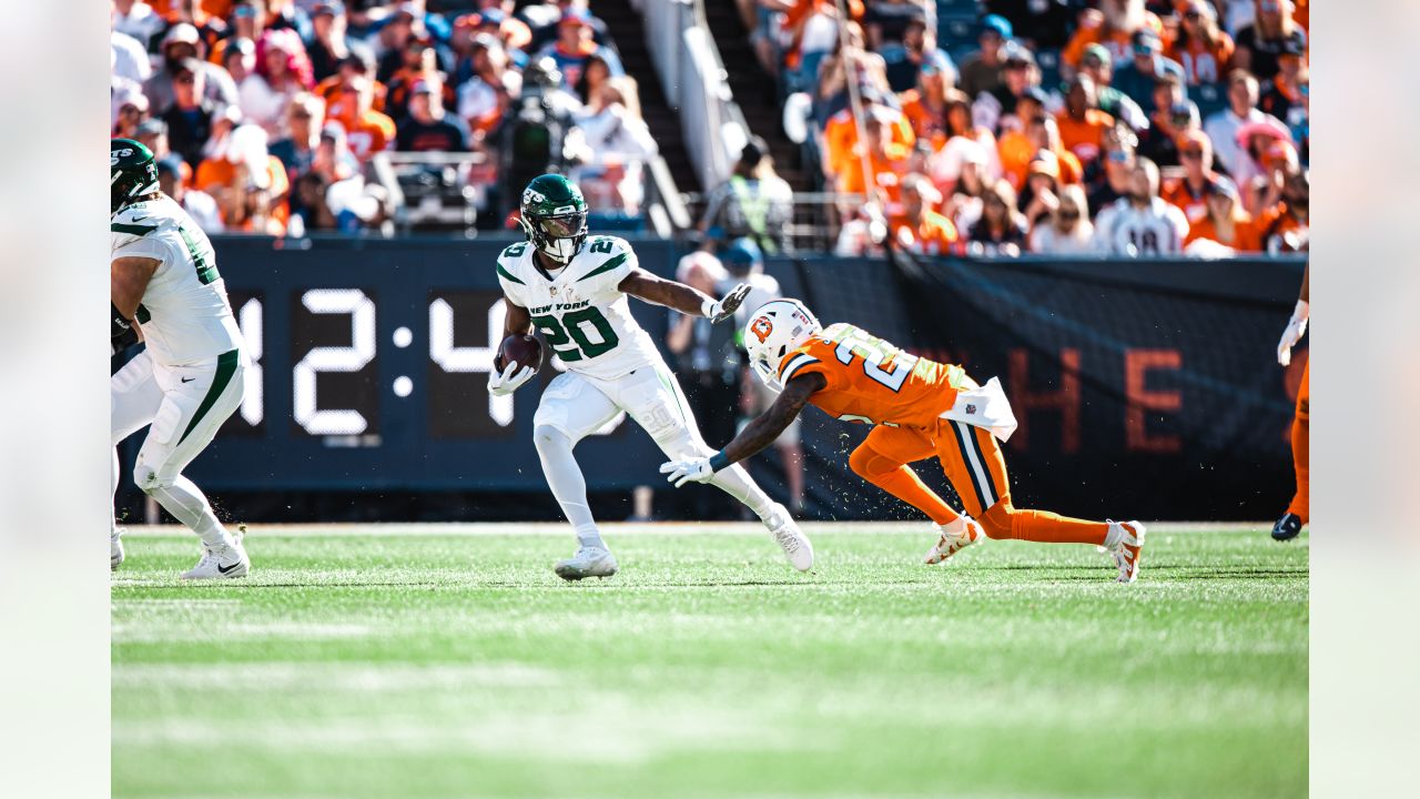 DENVER, CO - OCTOBER 23: New York Jets running back Breece Hall celebrates  his 62 yard touchdown run during a NFL game between the New York Jets and  the Denver Broncos on