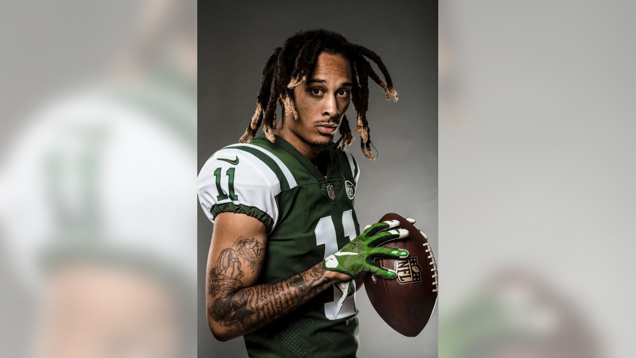 New York Jets wide receiver Robby Anderson (11) runs away from