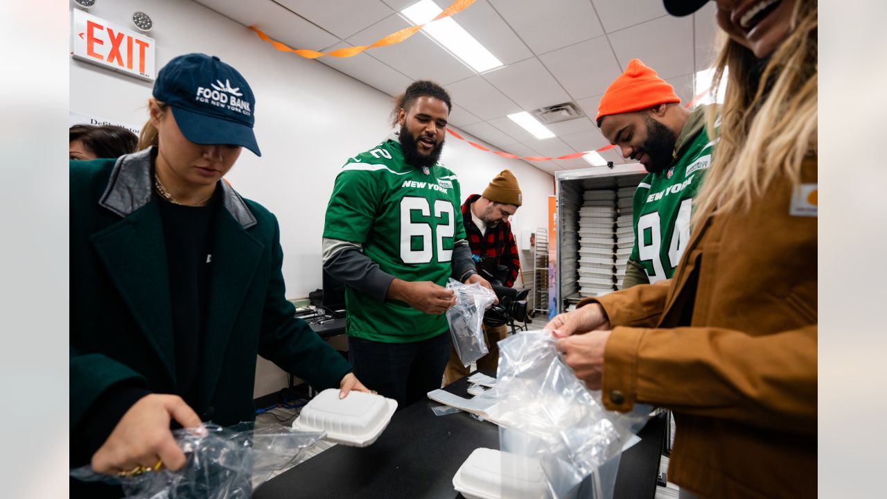 Braden Mann of the New York Jets wears a FDNY hat prior to the