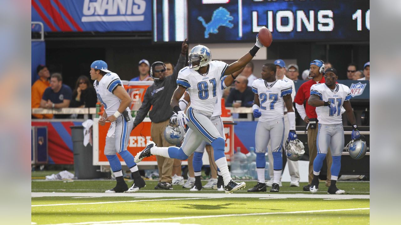 Detroit Lions wide receiver Herman Moore celebrates his first touchdown of  the season with fans during the third quarter against the Green Bay Packers  in Pontiac, Mich., Sunday, Oct. 8, 2000. Moore