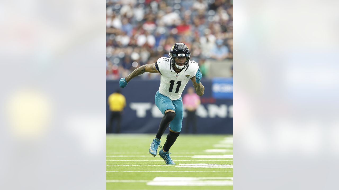 Jacksonville Jaguars wide receiver Marvin Jones Jr. (11) runs onto the  field for an NFL wild-card football game against the Los Angeles Chargers,  Saturday, Jan. 14, 2023, in Jacksonville, Fla. (AP Photo/Gary