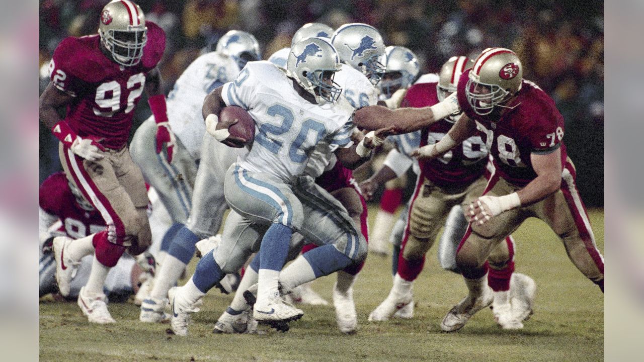 FILE - In this Jan. 12, 1992, file photo, Detroit Lions running back Barry  Sanders, left, looks for room to run against the Washington Redskins during  the second quarter of the NFC championship NFL football game at RFK Stadium  in Washington. Sanders wi