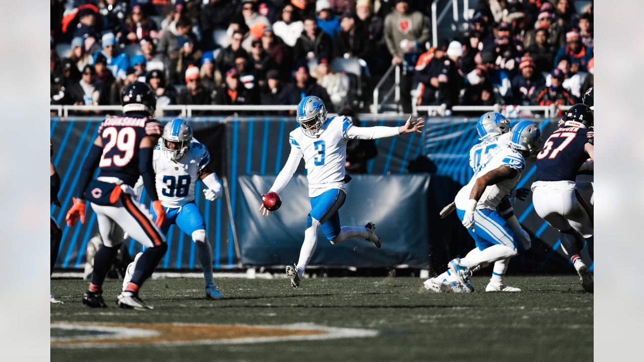 Detroit Lions punter Jack Fox (3) kicks off against the Green Bay