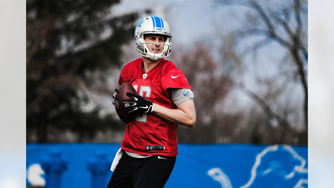 Official Lions oc ben johnson wearing lions DC aaron glenn shirt