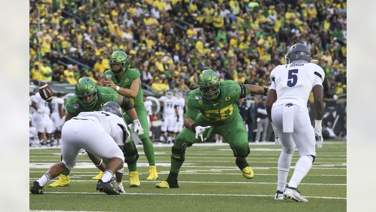 FILE PHOTOS).former Oregon Ducks offensive tackle (58) Penei