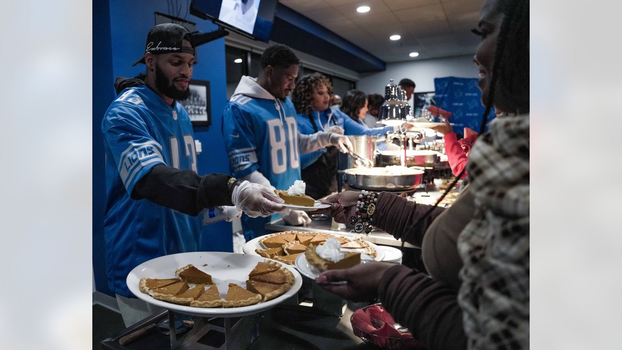 Detroit Lions, Pure Heart serve Thanksgiving dinner to children of