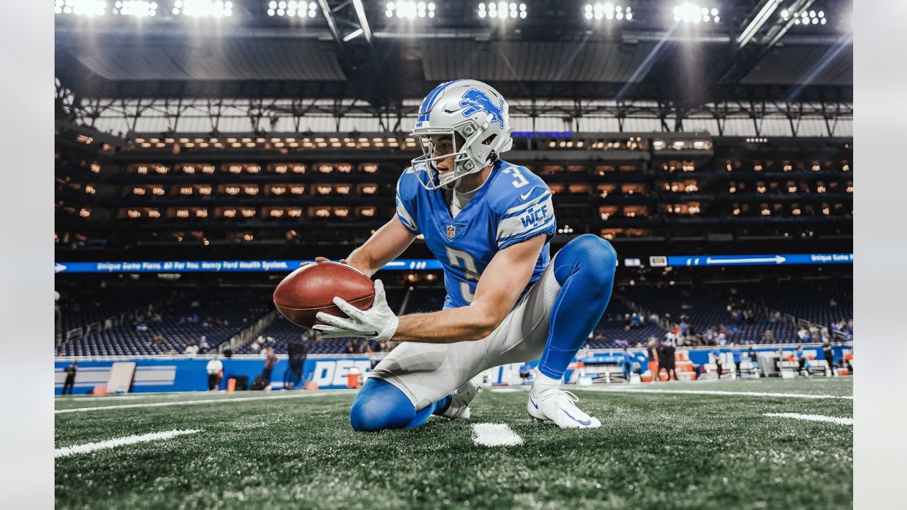 Detroit Lions punter Jack Fox completes a pass to Bobby Price for