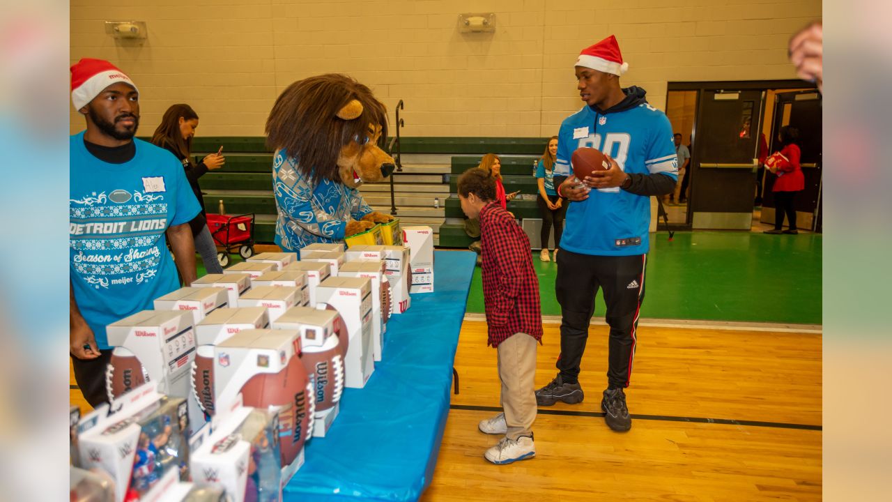 DLA students Shop with a Lion at Meijer, lion, Detroit Lions, shopping, The Lions took Detroit Lions Academy students Christmas shopping for our  annual Shop with a Lion at Meijer.