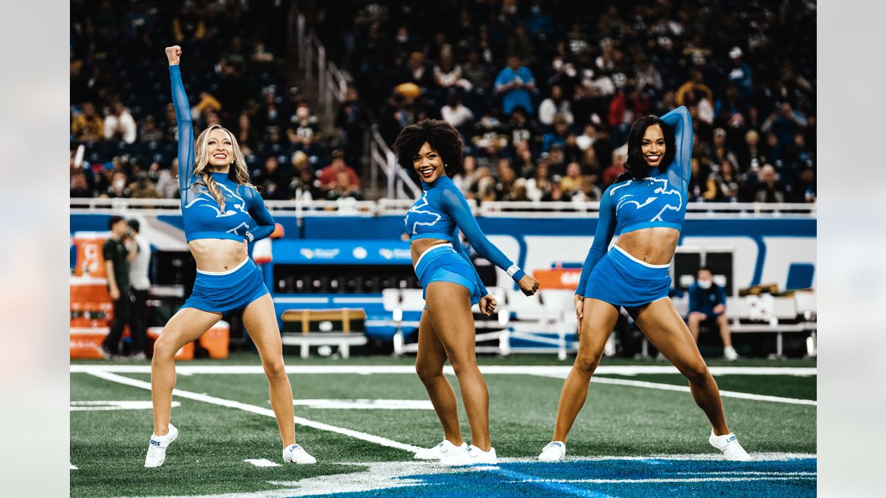 A Green Bay Packers cheerleader is seen before an NFL football