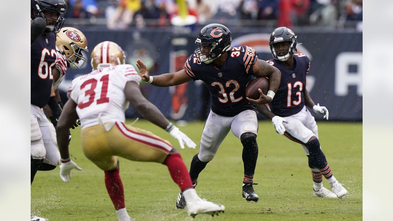 October 03, 2021: Chicago, Illinois, U.S. - Bears #32 David Montgomery  (right) celebrates his touchdown with teammate #81 J.P. Holtz during the  NFL Game between the Detroit Lions and Chicago Bears at