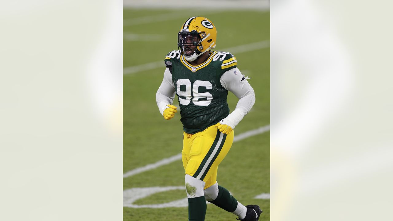 Jack Heflin of the Green Bay Packers walks off the field after the News  Photo - Getty Images