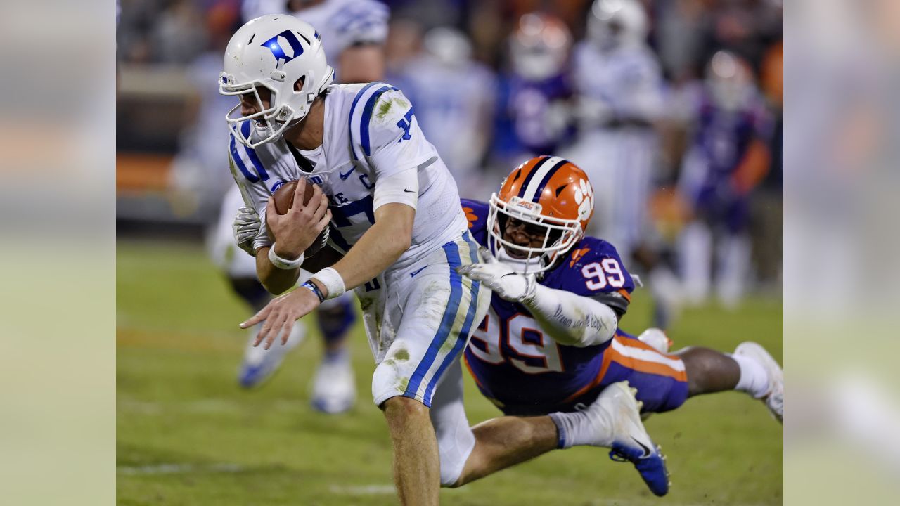 Defensive end Clelin Ferrell (99) grabs some air during a Las