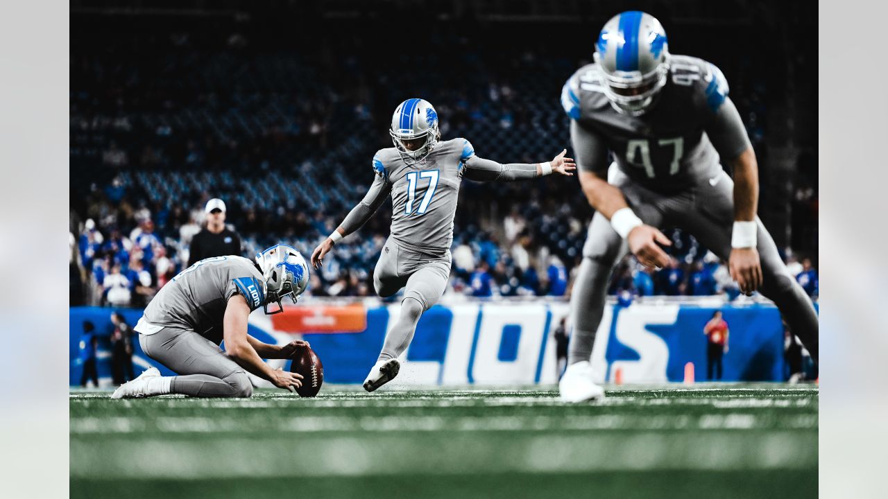 DETROIT, MI - NOVEMBER 24: Detroit Lions place kicker Michael Badgley (17)  kicks an extra point during a regular season NFL football game between the  Buffalo Bills and the Detroit Lions on