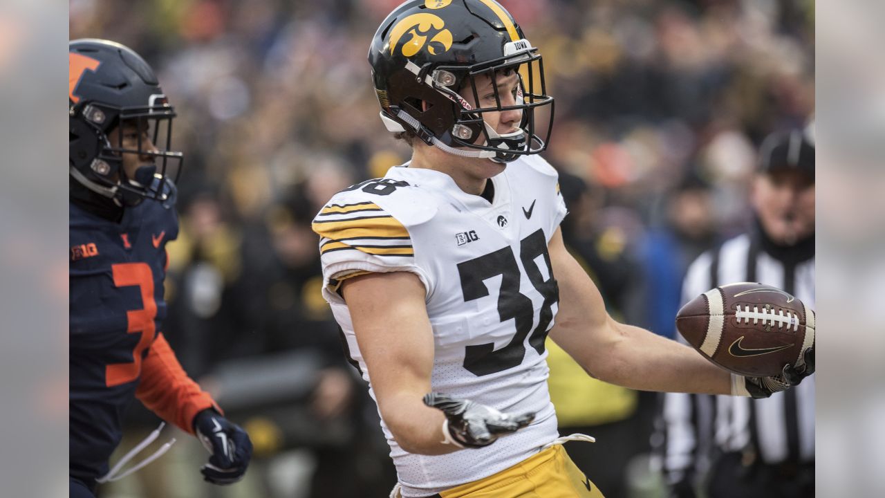 Iowa tight end T.J. Hockenson poses with his new team jersey after the  Detroit Lions selected Hockenson in the first round at the NFL football  draft, Thursday, April 25, 2019, in Nashville