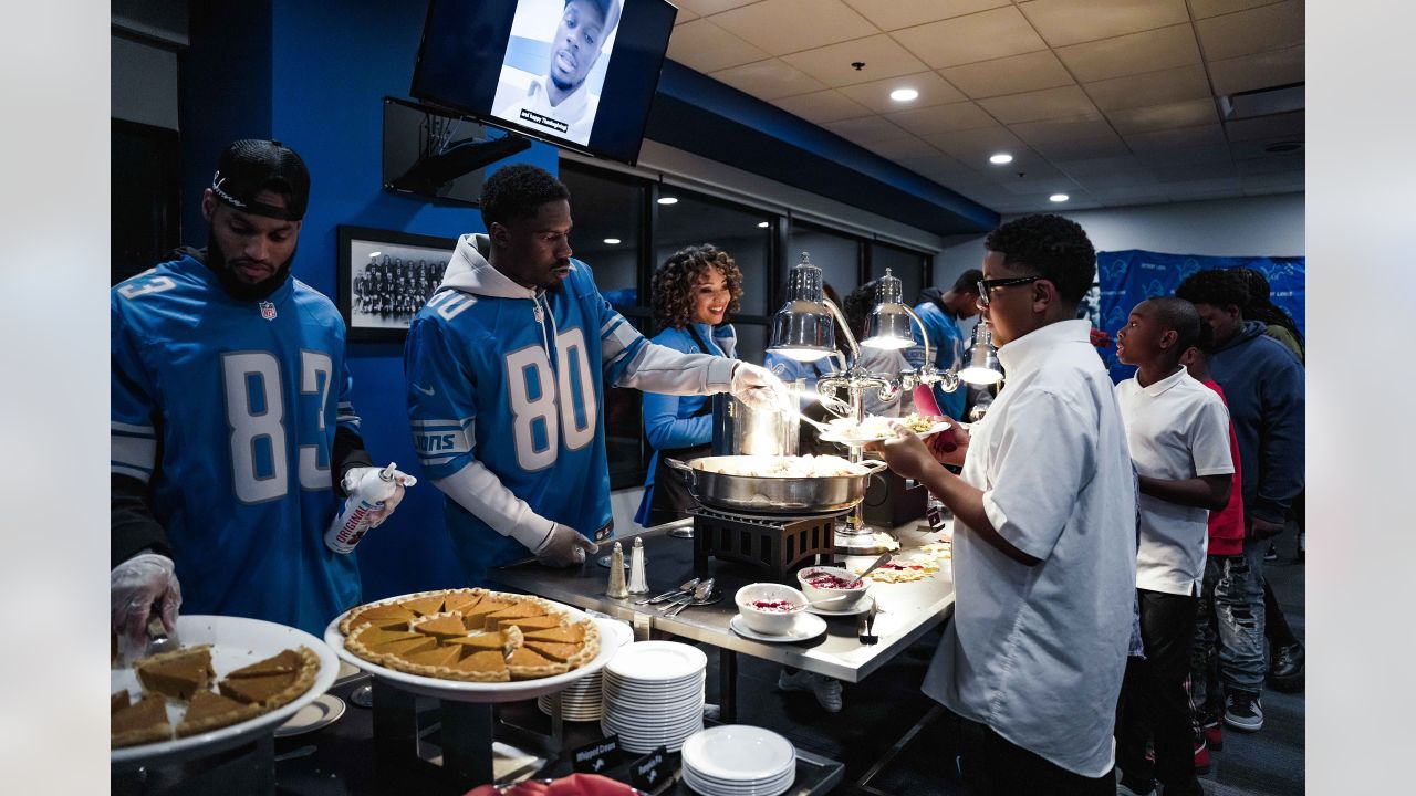 Detroit Lions, Pure Heart serve Thanksgiving dinner to children of