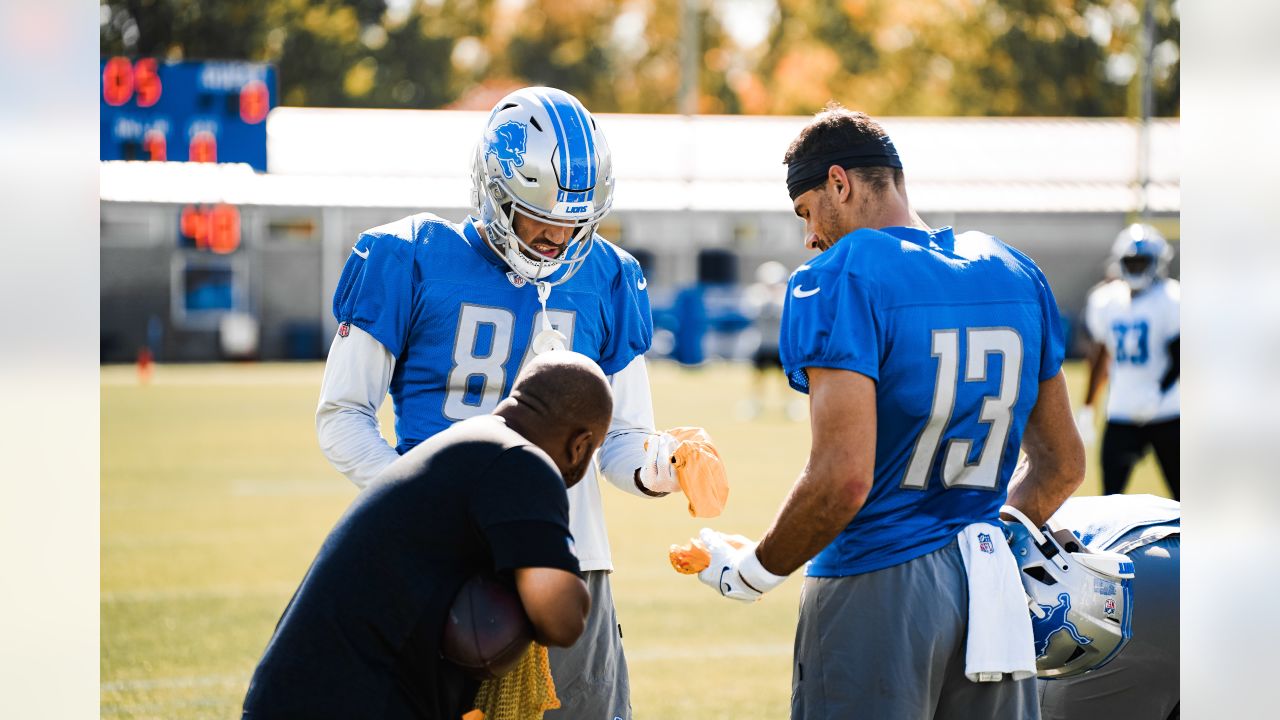 Lions down 9 players at practice; WR Amon-Ra St. Brown in red no-contact  jersey 