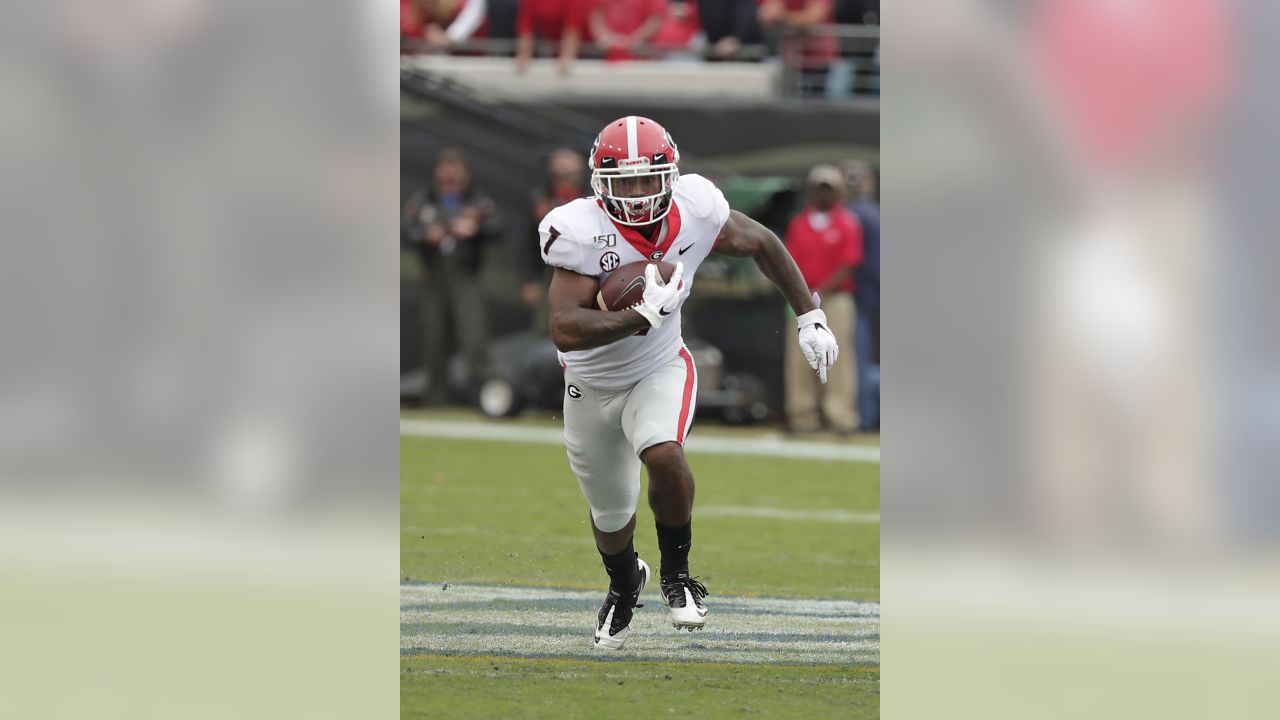 ATLANTA, GA - SEPTEMBER 03: Current Detroit Lions Running Back and former  Georgia Bulldog player DeAndre Swift looks on during the Chick-Fil-A  Kickoff Game between the Oregon Ducks and the Georgia Bulldogs