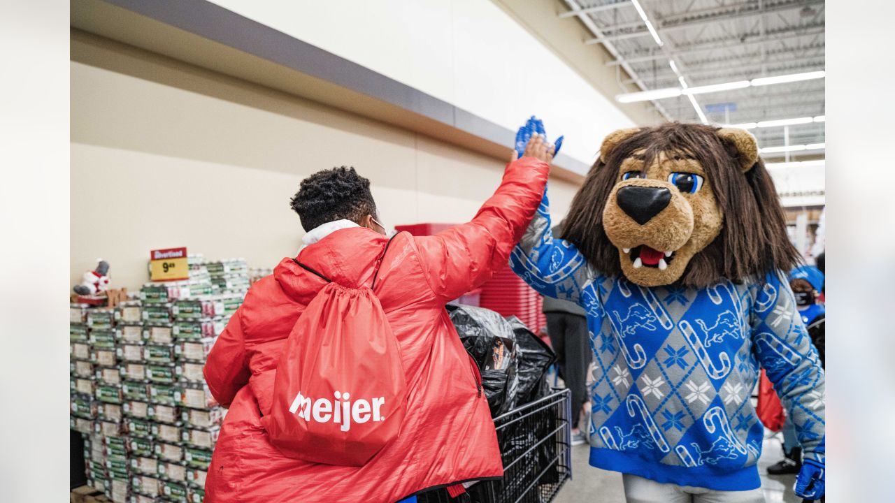 DLA students Shop with a Lion at Meijer, lion, Detroit Lions, shopping, The Lions took Detroit Lions Academy students Christmas shopping for our  annual Shop with a Lion at Meijer.