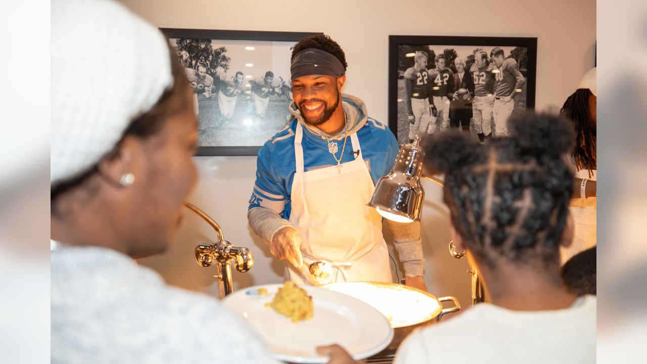 Detroit Lions, Pure Heart serve Thanksgiving dinner to children of