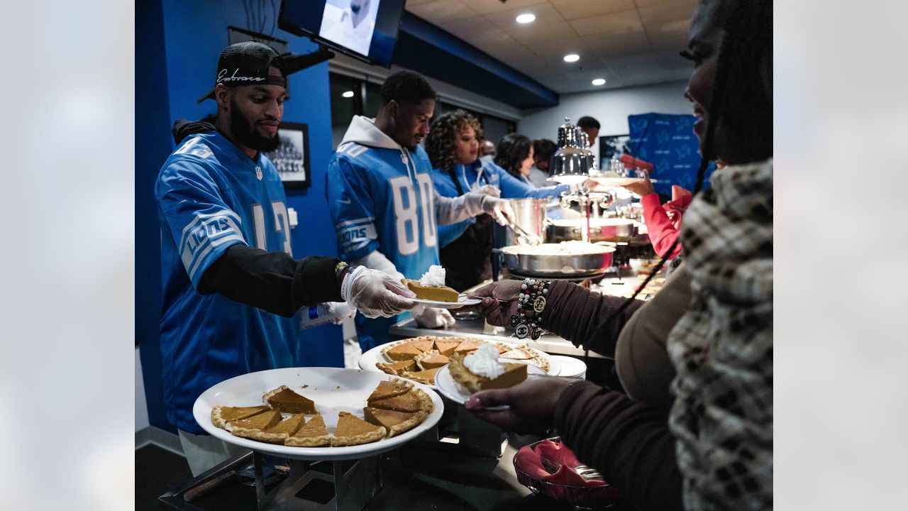 Detroit Lions, Pure Heart serve Thanksgiving dinner to children of