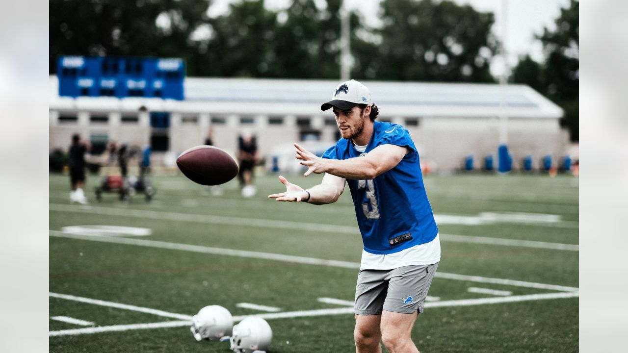 Detroit Lions punter Jack Fox (3) punts against the Seattle