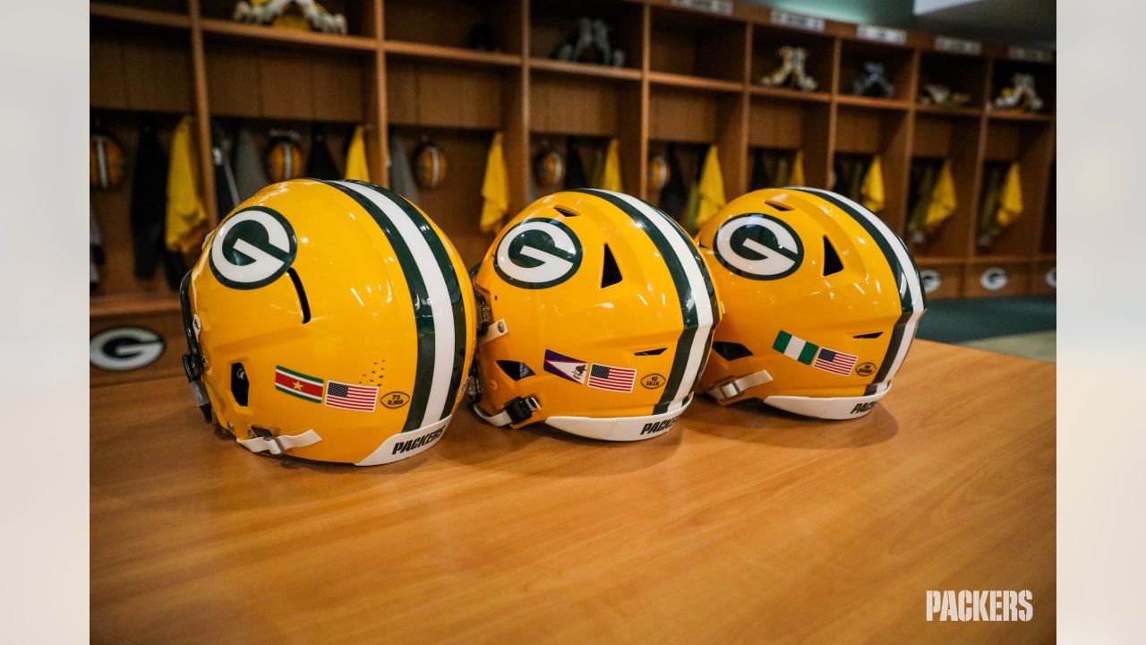 Packers players participate in NFL international flag decal initiative