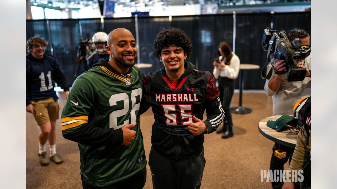 Photos: Packers surprise high school football teams with new helmets