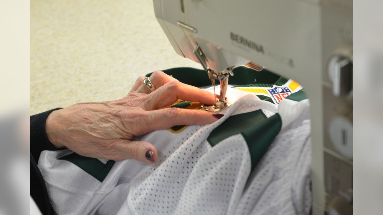 Captains patches are sewn to Packers jerseys