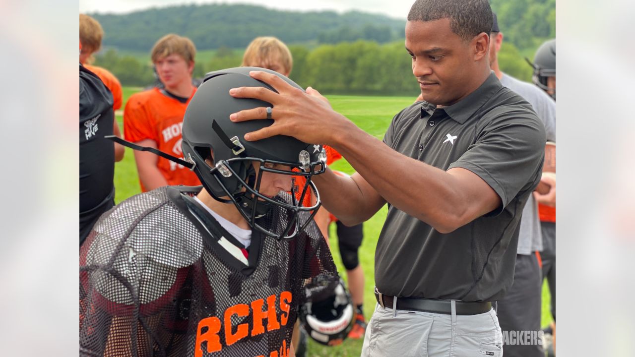 Photos: Packers surprise high school football teams with new helmets