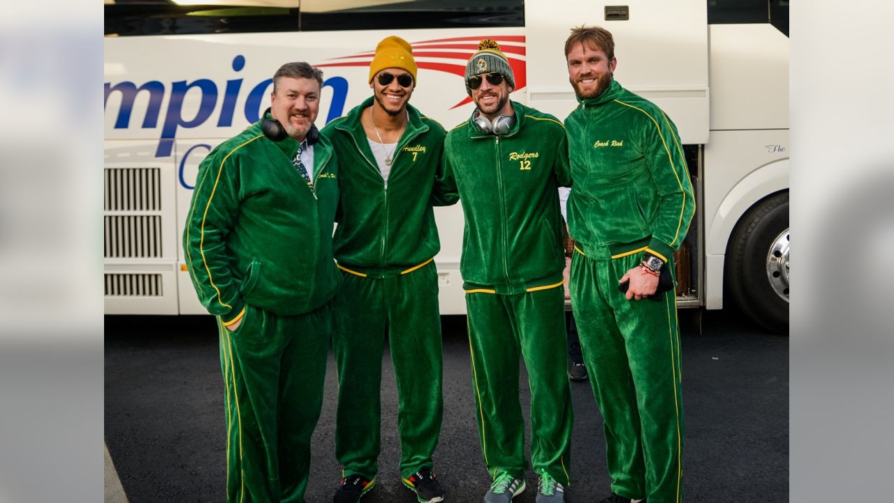 Packers wear Christmas suits to North Carolina