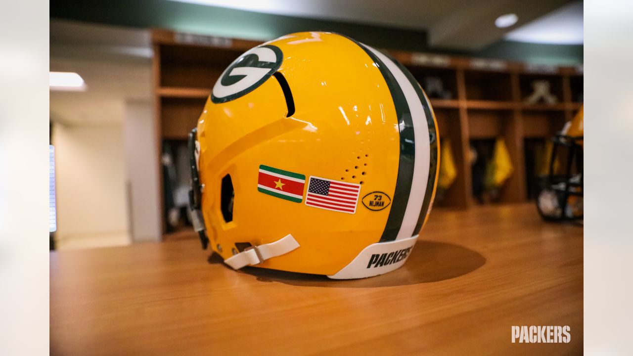 Packers players participate in NFL international flag decal initiative