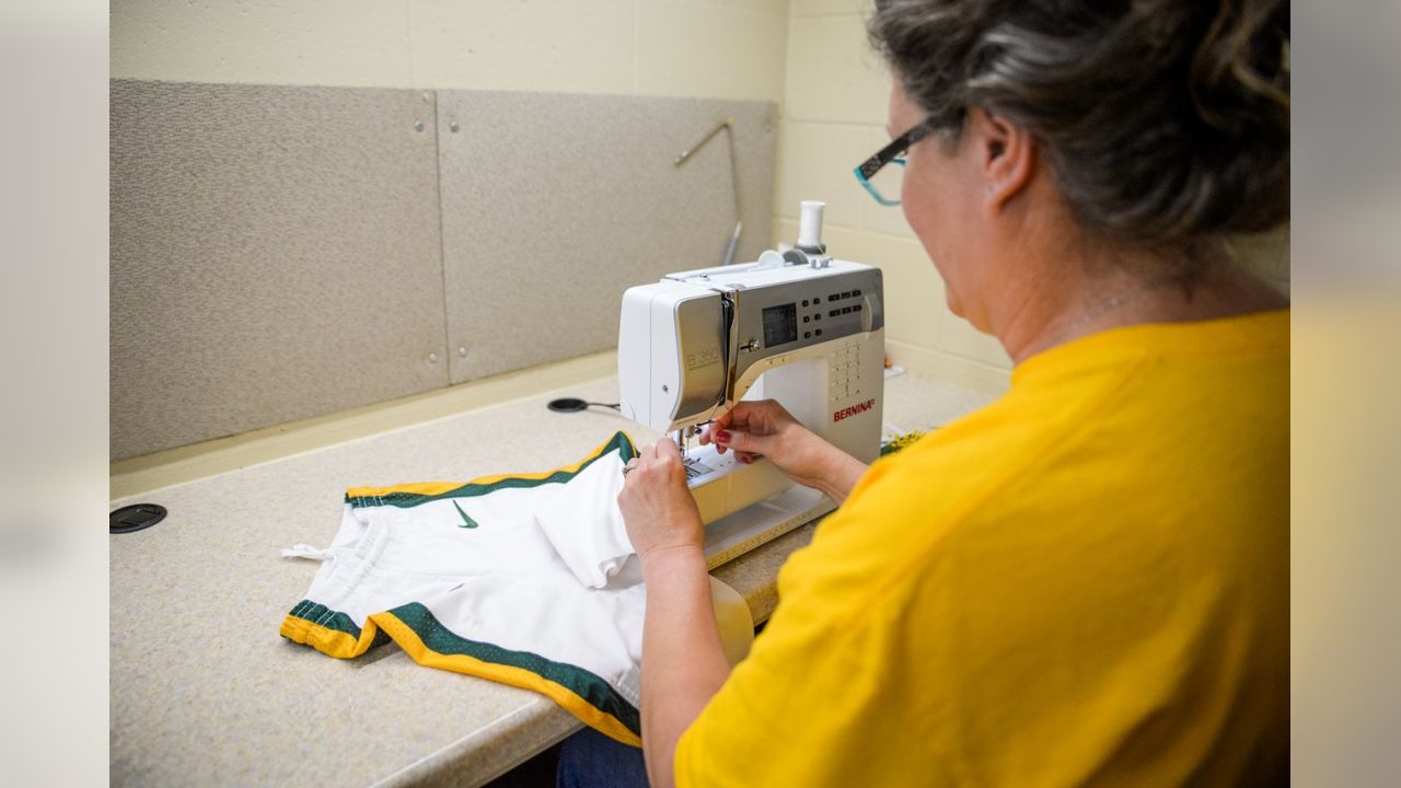 Green Bay Packers on Twitter: Take a look inside the #Packers sewing room  as the seamstresses prepare the historic third jerseys for this Sunday. 