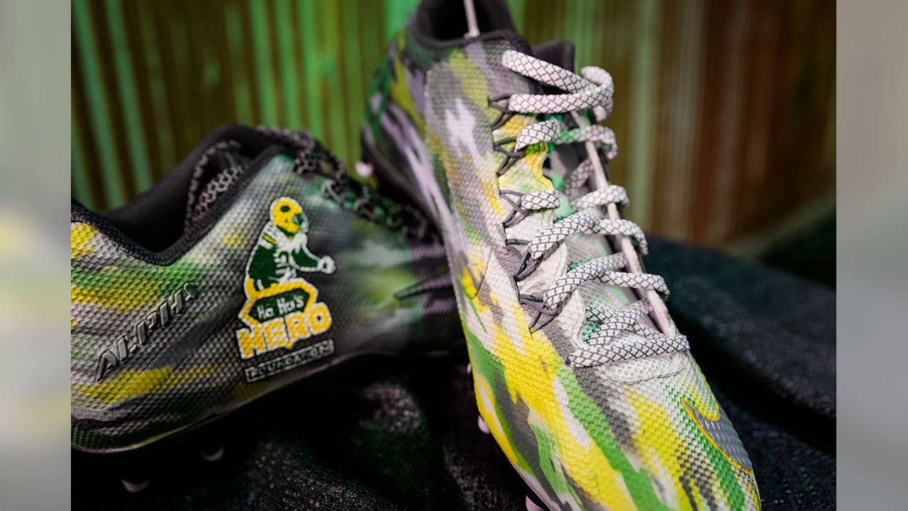 Green and gold football on sale cleats