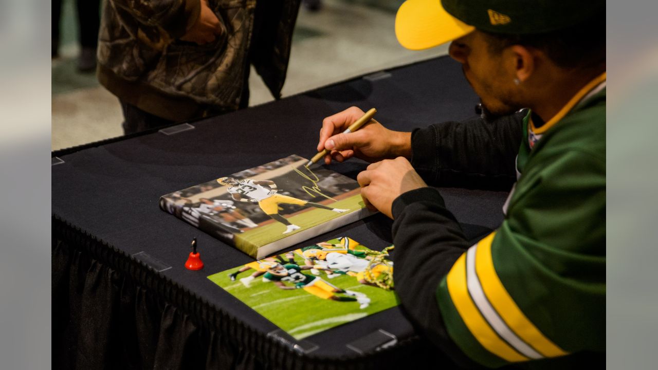 Jaire Alexander was signing autographs at Soldier Field  before