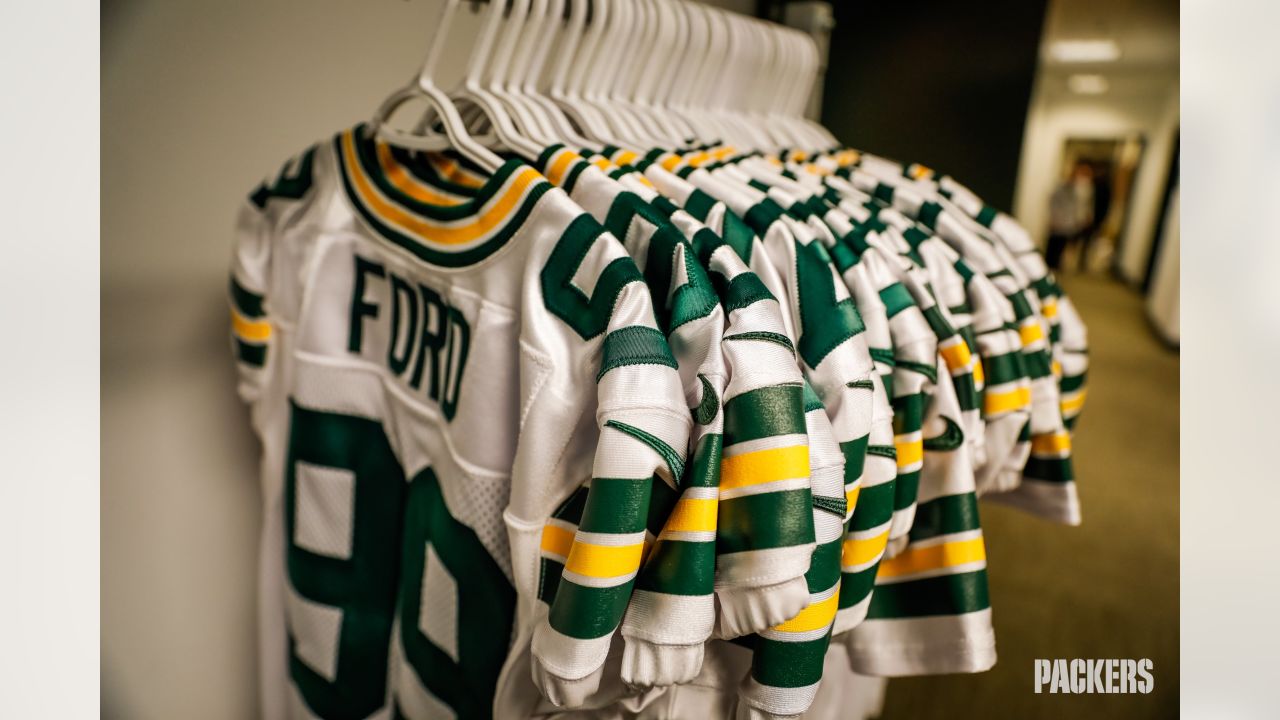 Behind the scenes: Packers' white-out uniforms ready for Titans game