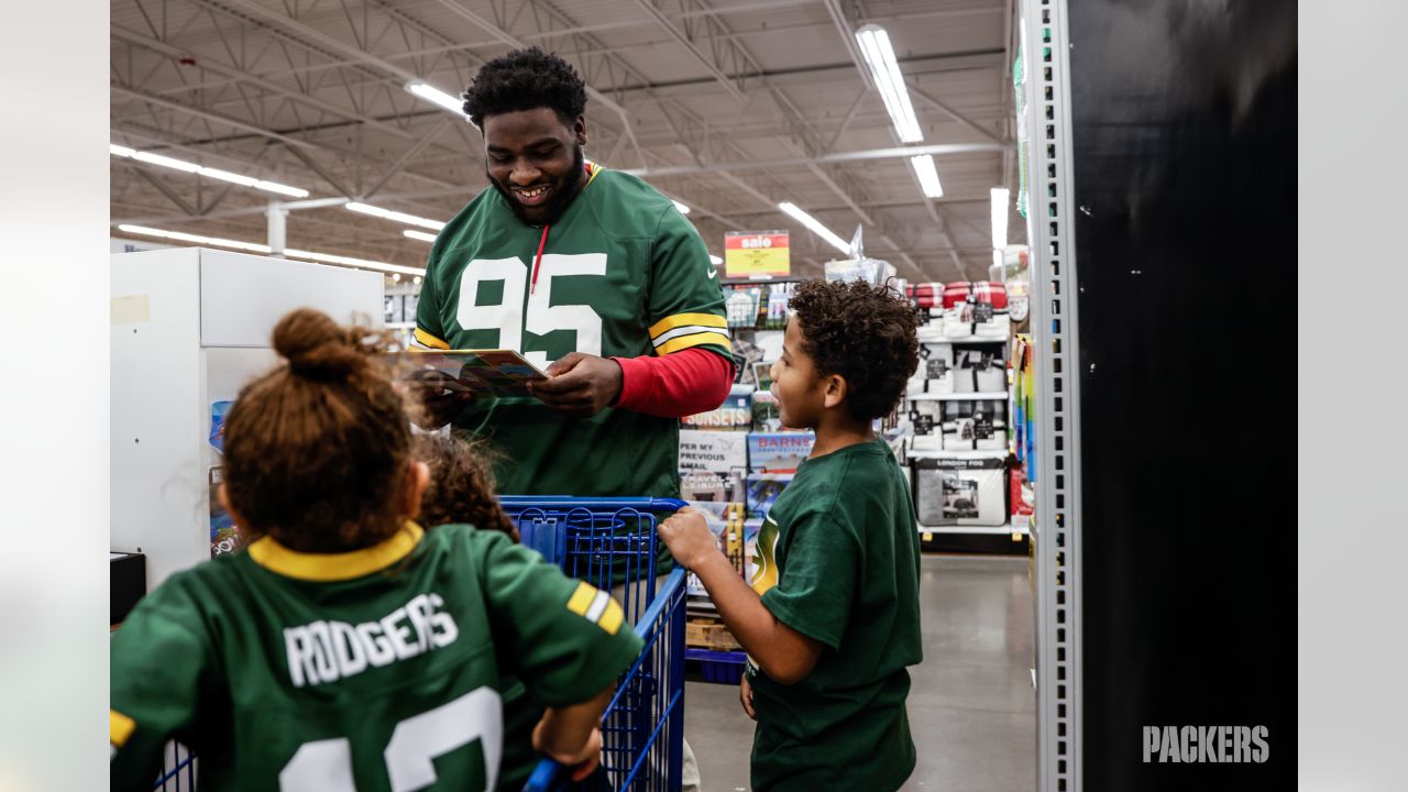 Photos: Packers players shop with kids from Pals Program at Meijer