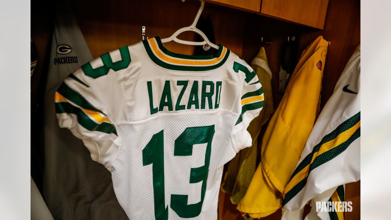 Behind the scenes: Packers' white-out uniforms ready for Titans game