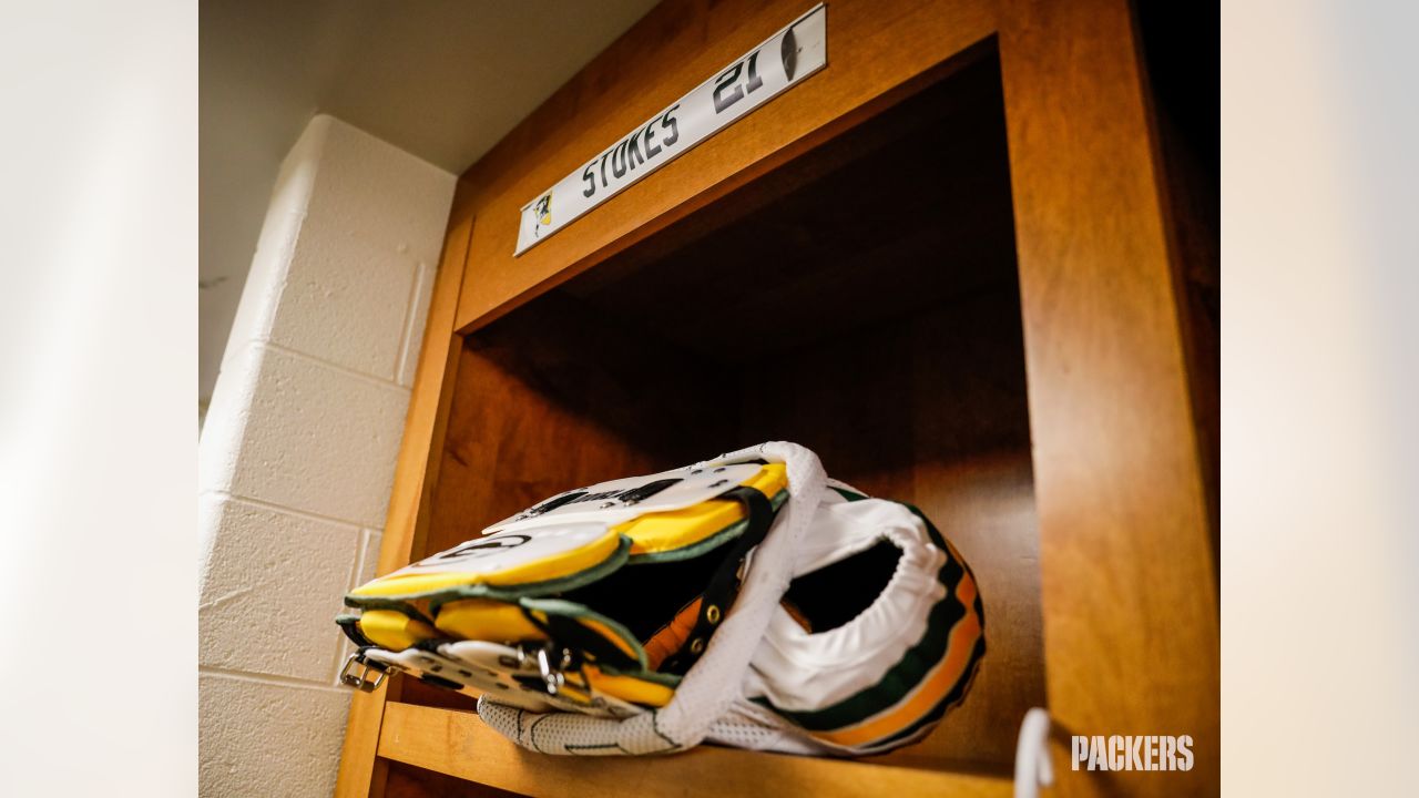 Details in Detroit: Packers' equipment staff prepares uniforms for