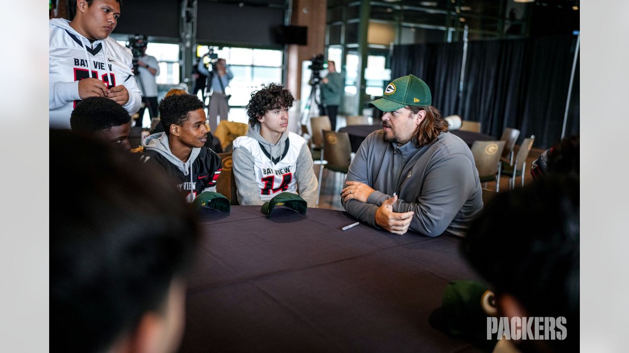 Photos: Packers surprise high school football teams with new helmets