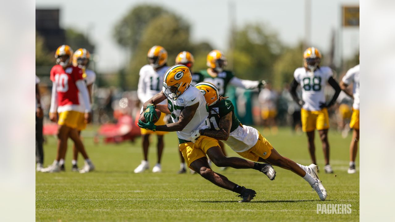 Football & friends. Jordy Nelson visited practice today! 