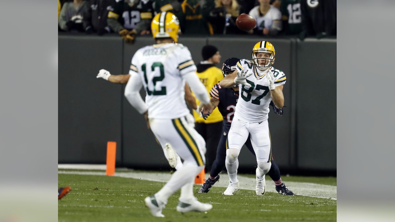 Aaron Rodgers in the Green Bay Packers all-white color rush uniform