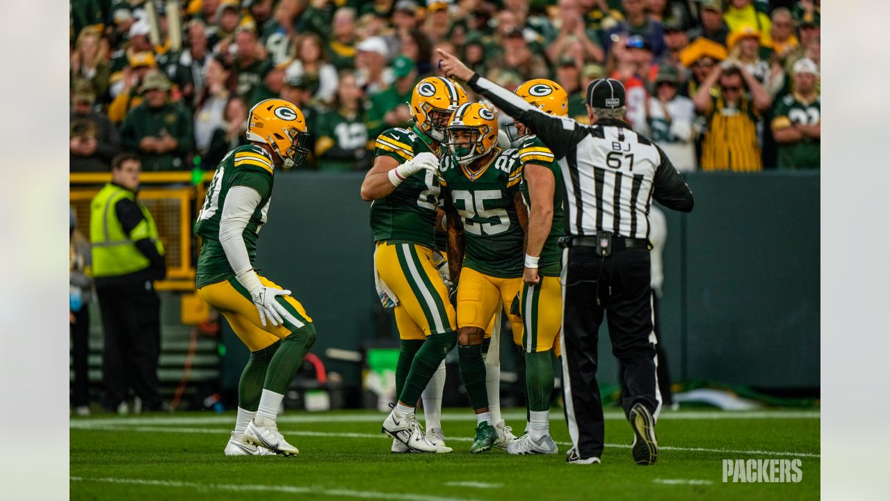 Packers escape Patriots in overtime at Lambeau Field