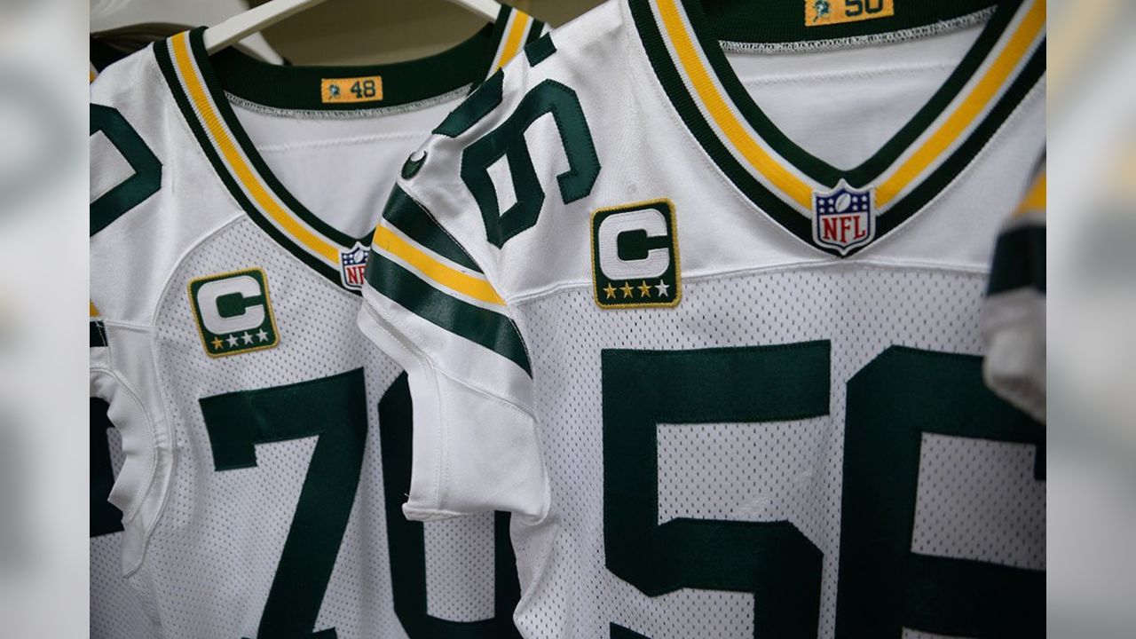 Captains patches are sewn to Packers jerseys