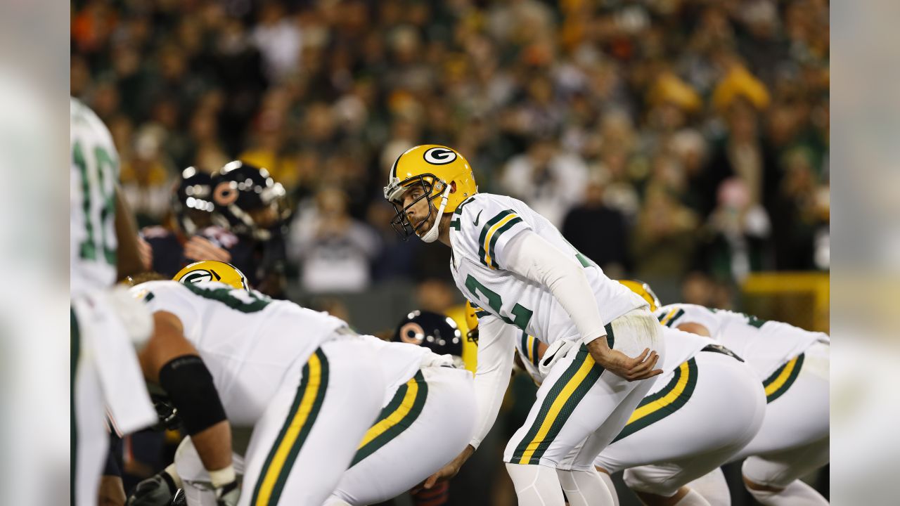 Aaron Rodgers in the Green Bay Packers all-white color rush uniform