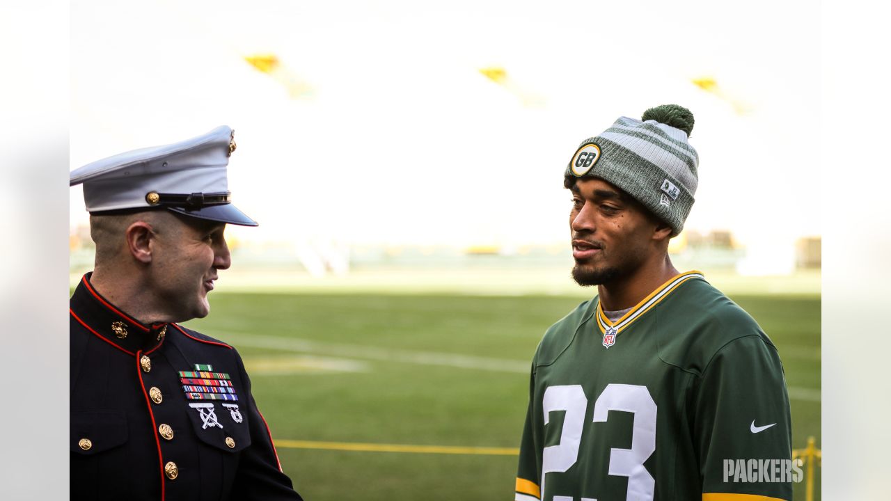 Photos: Packers, Jaire Alexander award donations to Toys for Tots at  Lambeau Field