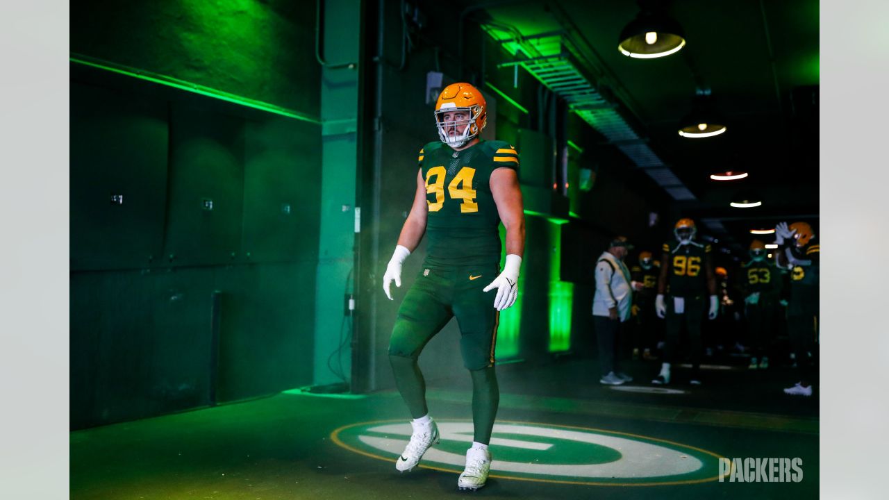 Field View: Green Bay Packers walk out of tunnel in all-green unis