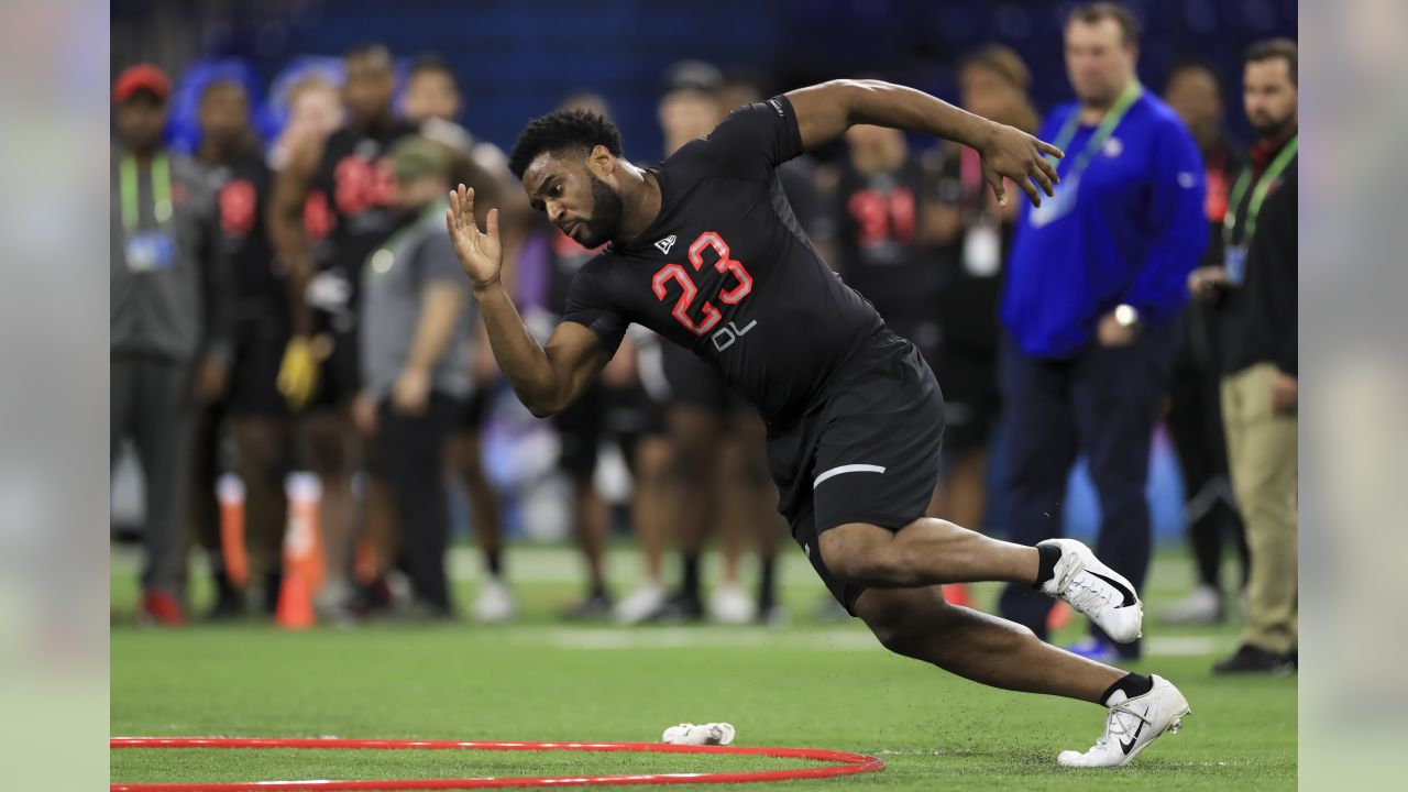 Utah defensive lineman John Penisini runs a drill at the NFL