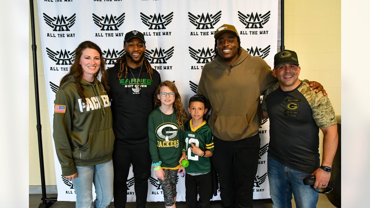 Military families meet Packers' Jones, shop for free at